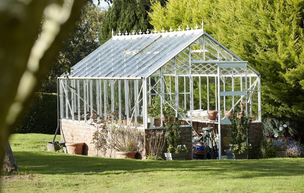Greenhouse in the garden at Orchard View, Pulverbatch