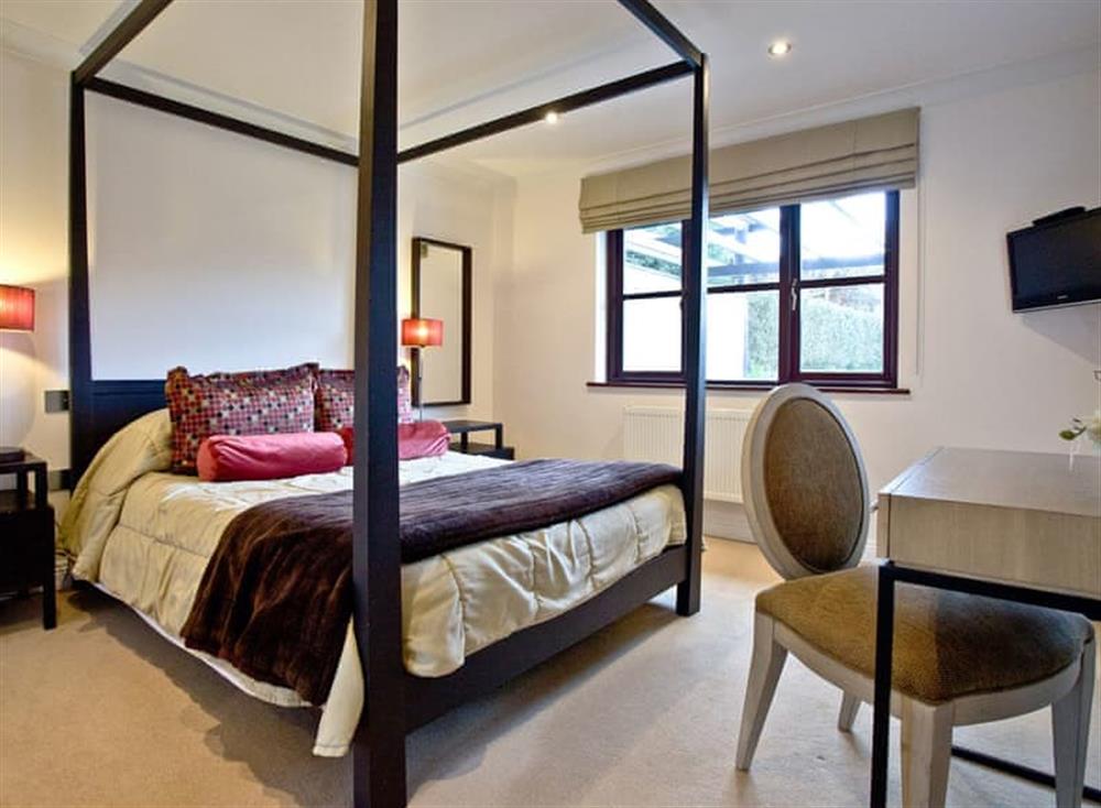 Four Poster bedroom at Orchid in Woodland Retreat, Wadebridge