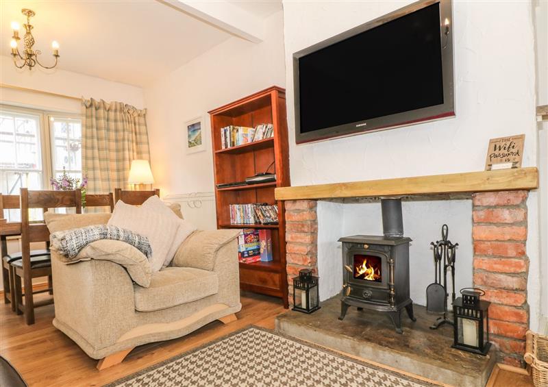 Relax in the living area (photo 2) at Oriel Cottage, Conwy