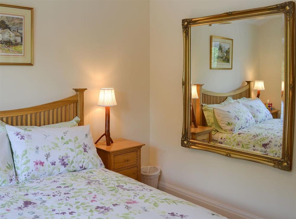 Double bedroom with kingsize bed at Oriels Retreat in Ashworth Valley, near Bury, Lancashire