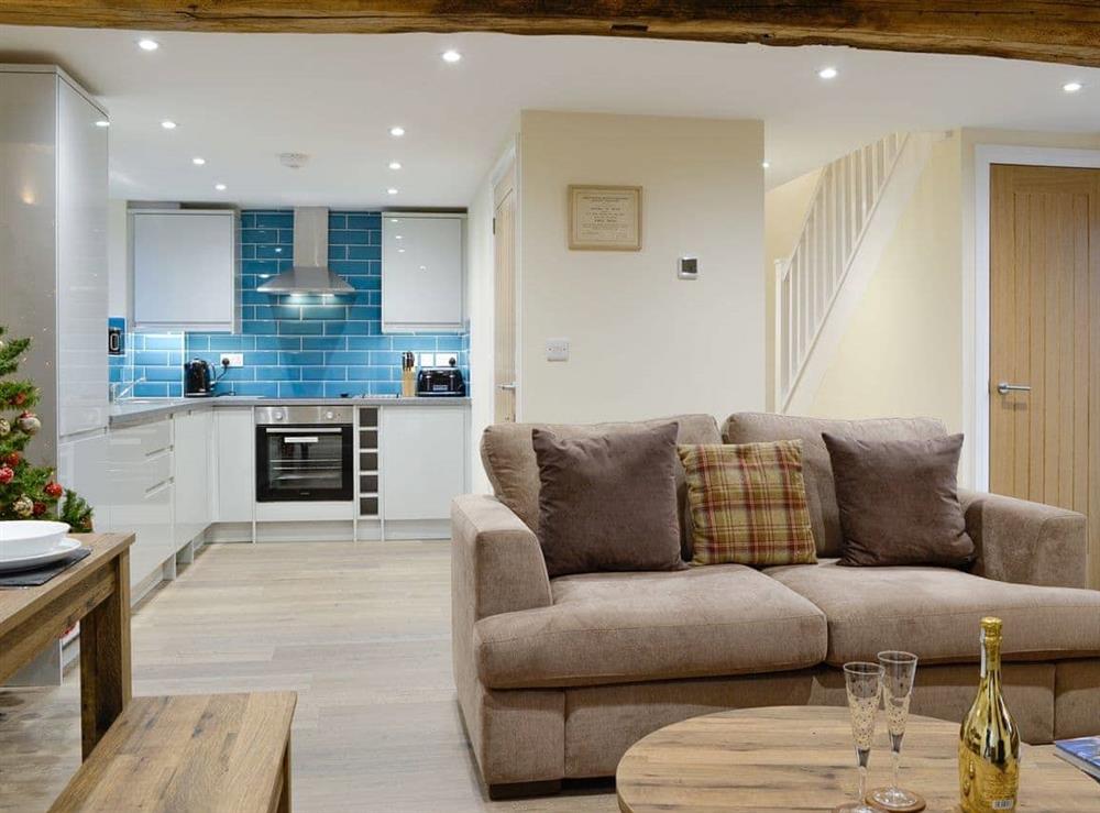 Attractive open-plan living space at Tarn Rigg Cottage, 
