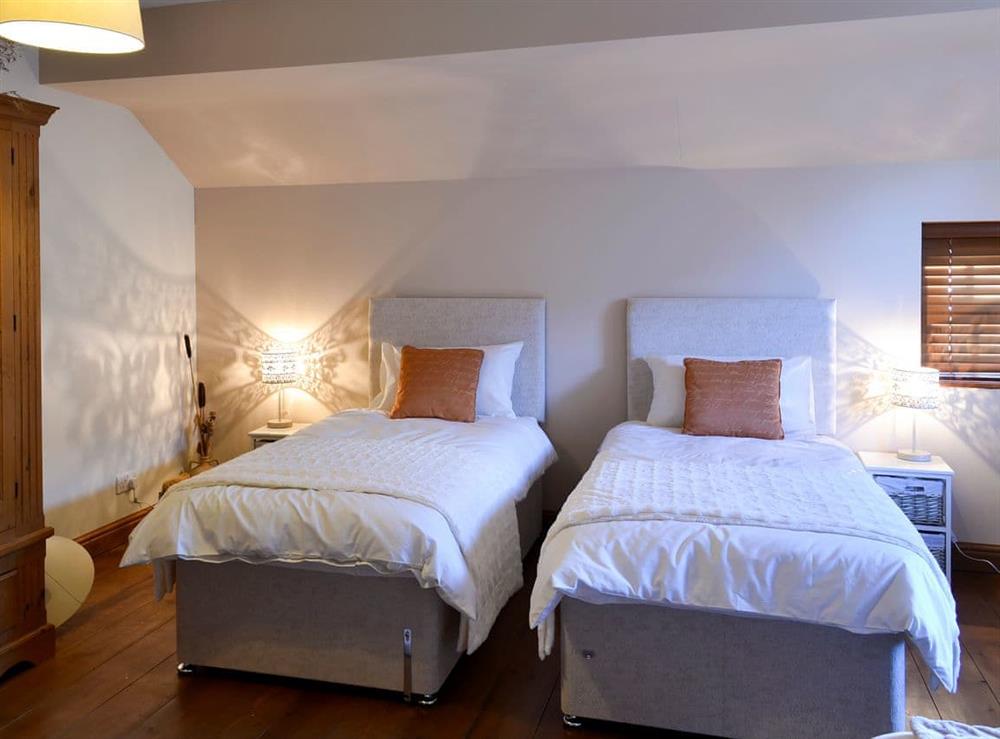Large bedroom with a double and twin beds at Ornella View in Mickleton, near Middleton-in-Teesdale, County Durham, England
