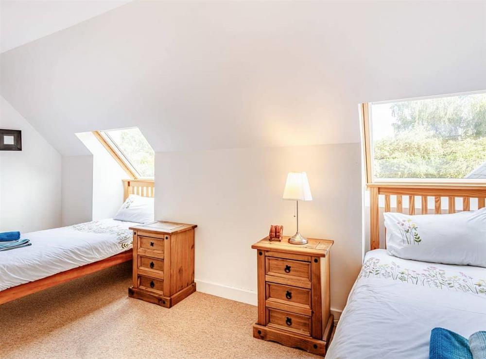 Twin bedroom at Osprey Cottage in Boat of Garten, Inverness-Shire