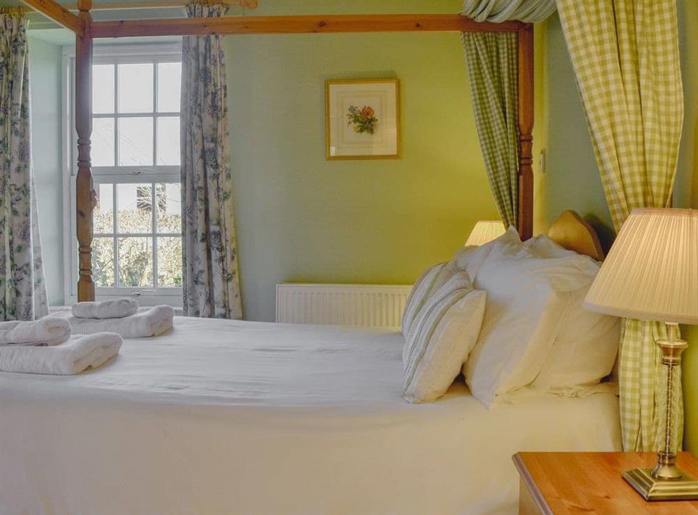 Comfortable four poster bedroom at Osprey Cottage in Meigle, Perthshire., Great Britain