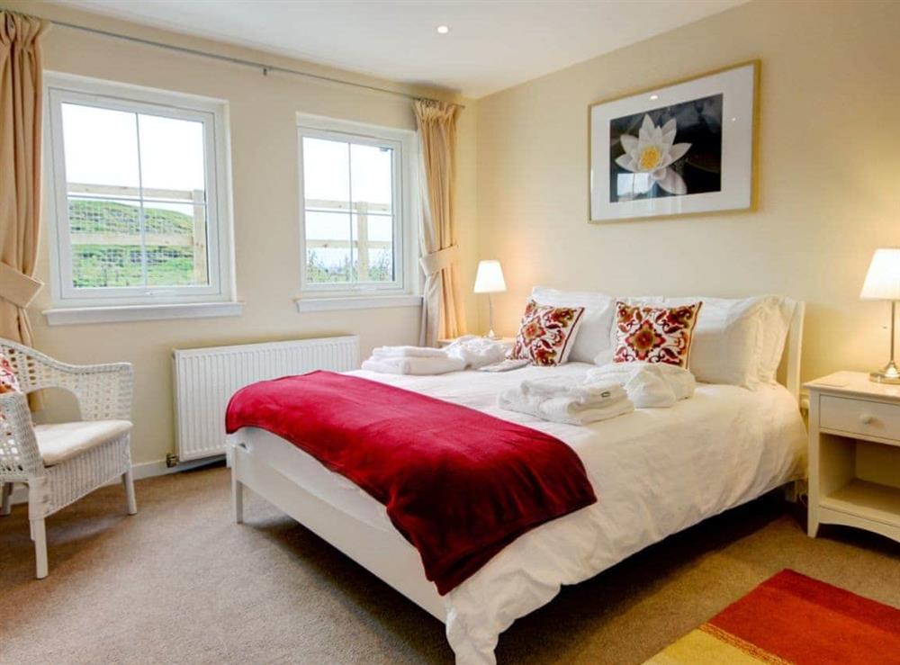 Double bedroom at Buzzard Cottage, 