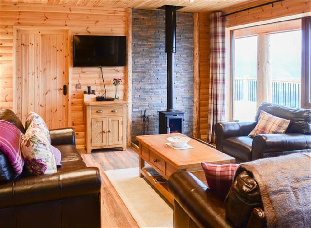 Warm and cosy living area with fantastic views at Osprey Lodge in Rogart, near Dornoch, Northern Highlands, Sutherland