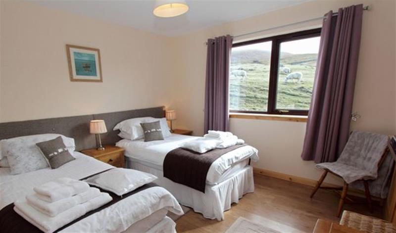 One of the bedrooms at Otter Cottage, Scarista near Leverburgh