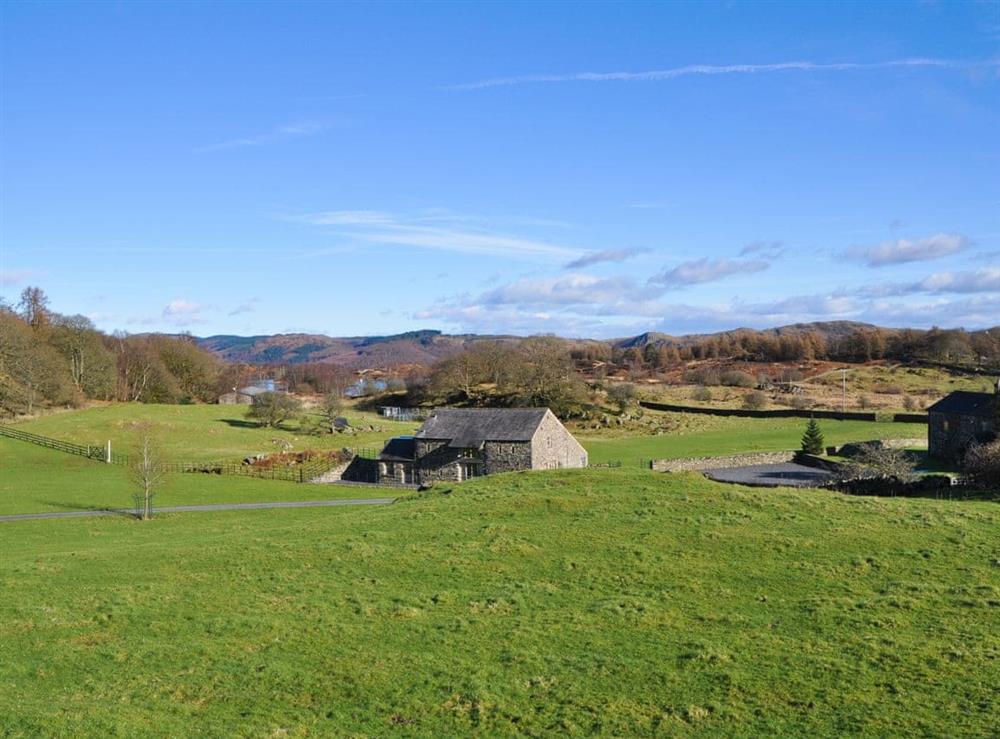 Holiday home in a wonderful setting at Otter Tarn: Mungeon Barn in Backbarrow, near Newby Bridge, Cumbria