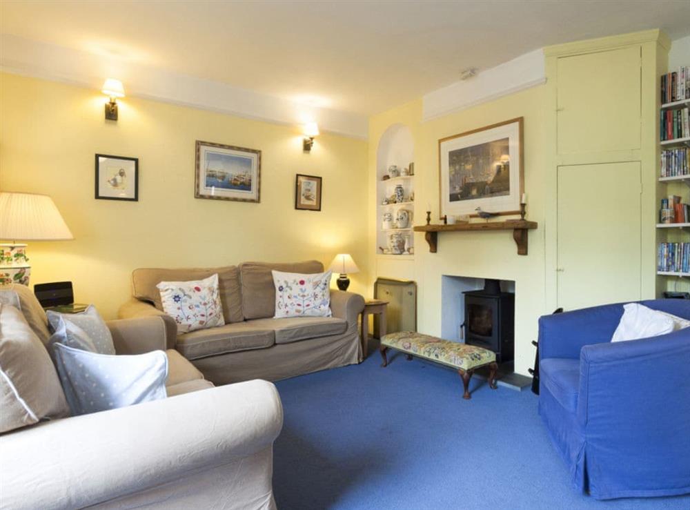 Living room/dining room at Otters Cottage in Salcombe, Devon