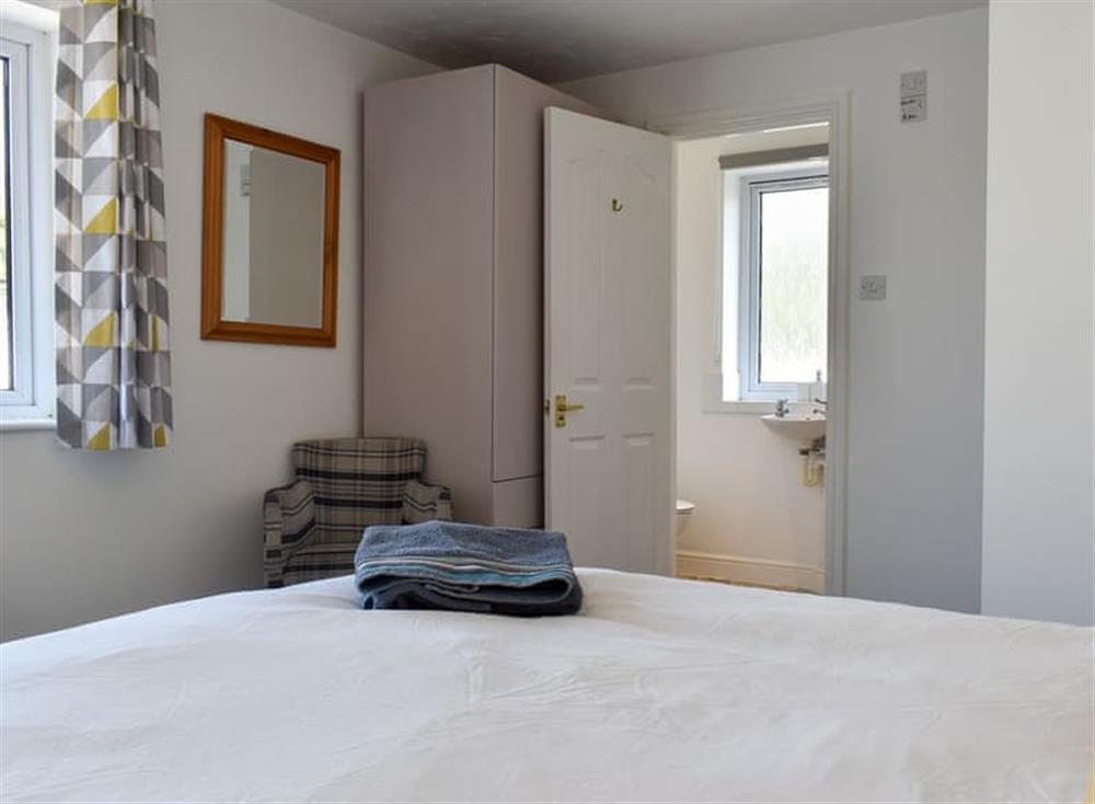 Spacious bedroom with kingsize bed and en-suite (photo 2) at Our Retreat in Kingsbridge, Devon