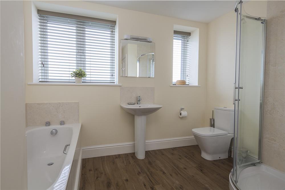 First floor family bathroom with bath and shower at Overcombe in , Salcombe