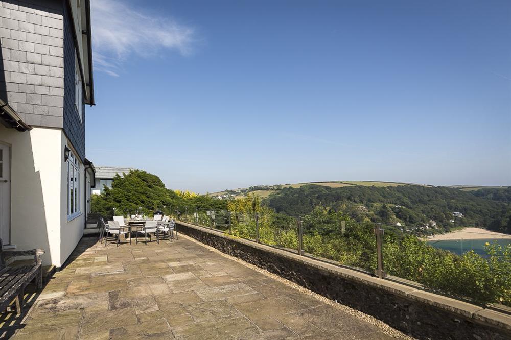 Large terrace with table and chairs overlooking Salcombe Estuary
