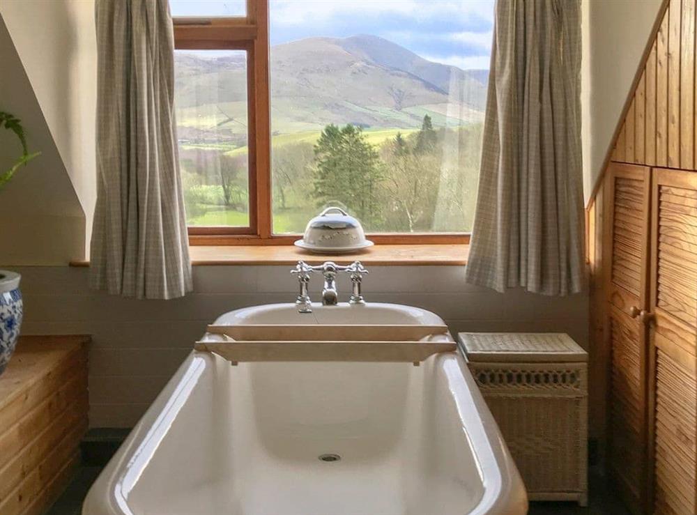 Bathroom with stunning views at Overwater Lodge in Wigton, Cumbria