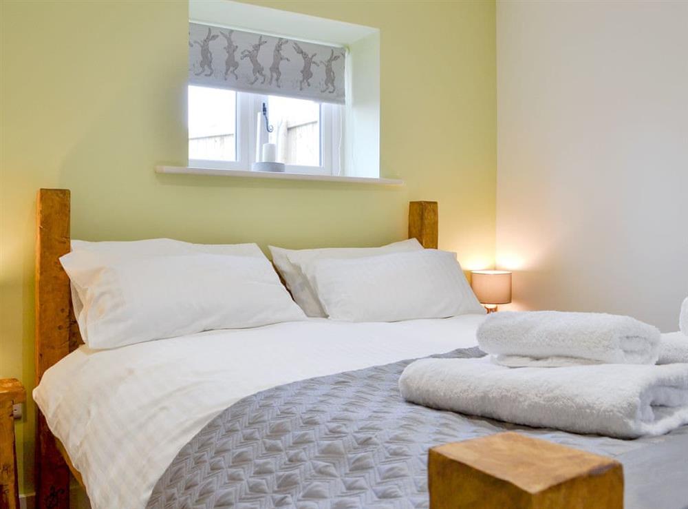 Comfortable double bedroom at Dringhoe Hall Cottages, 