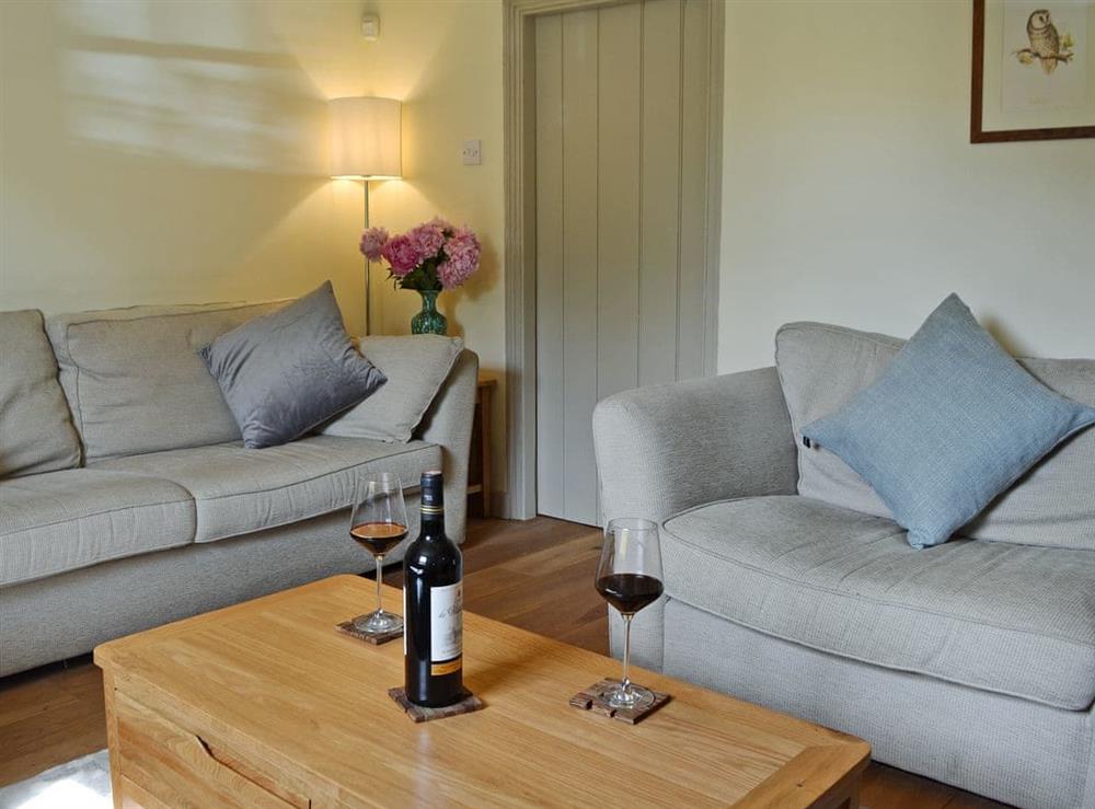 Lovingly furnished living room at Owl Cottage in Canterbury, Kent