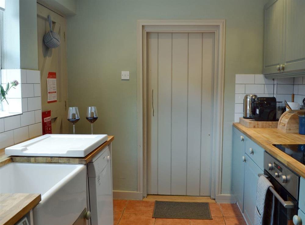 Wonderful galley style kitchen (photo 2) at Owl Cottage in Canterbury, Kent