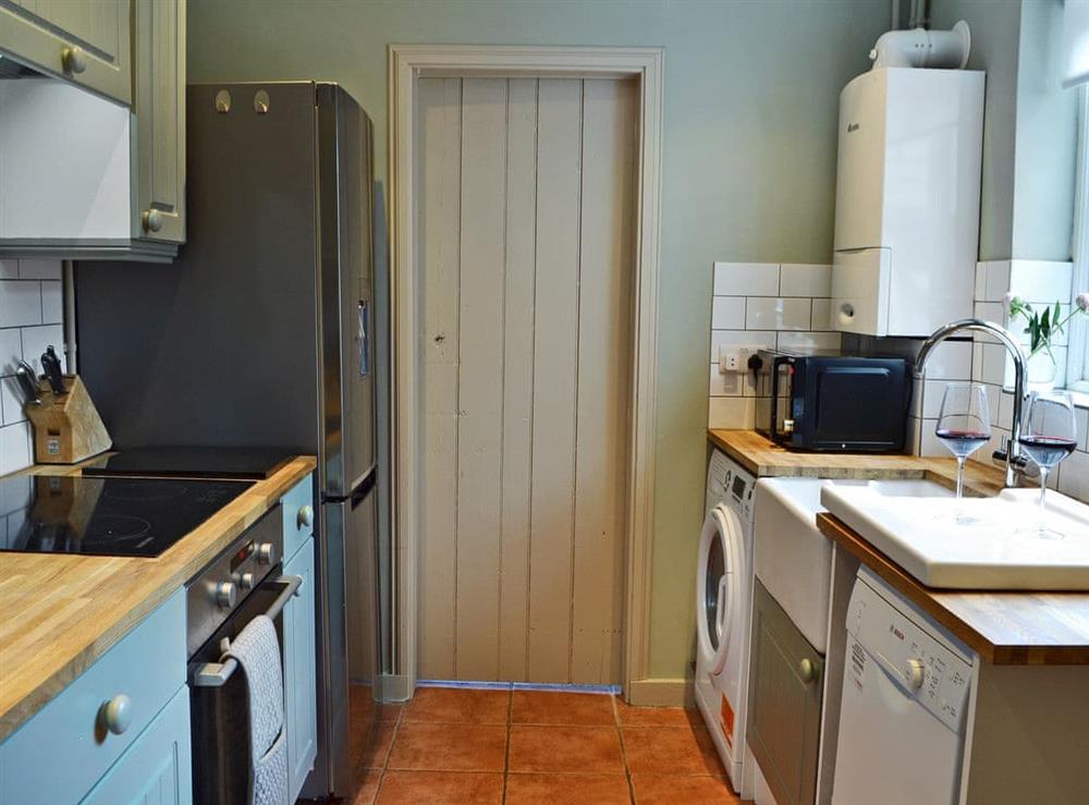 Wonderful galley style kitchen at Owl Cottage in Canterbury, Kent