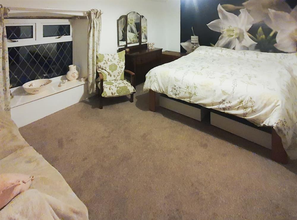Generous sized front bedroom with king sized bed at Owl Cottage in Crich, near Matlock, Derbyshire