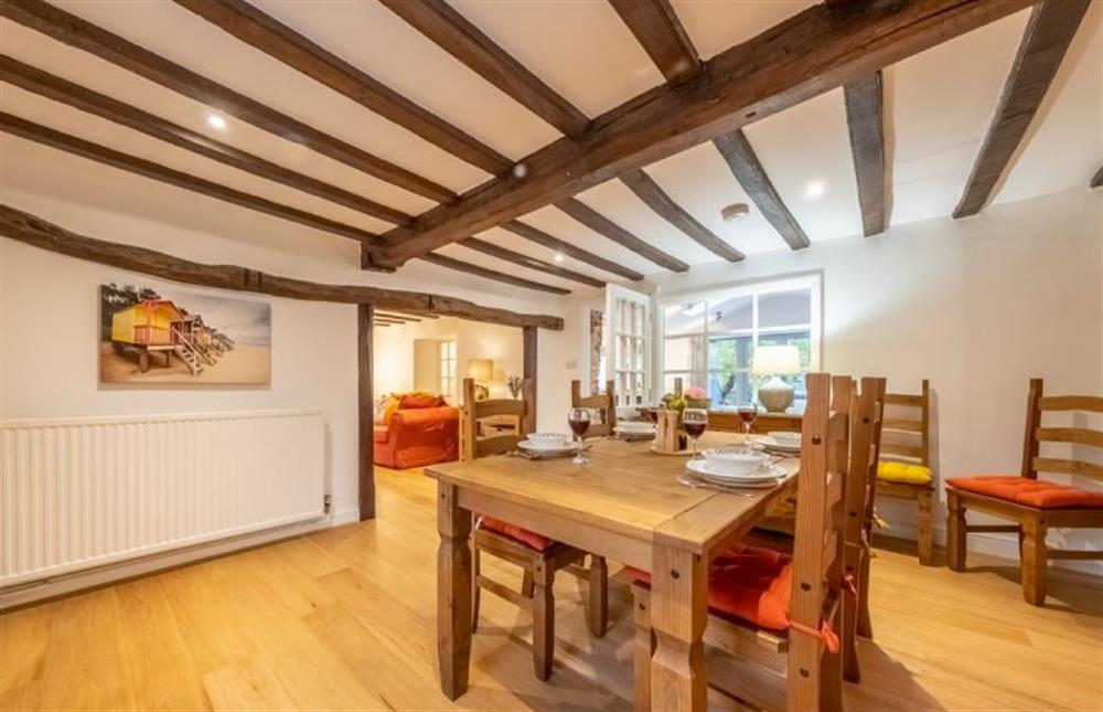 The dining room with the sitting room in the distance at Owl Cottage, Great Snoring near Fakenham