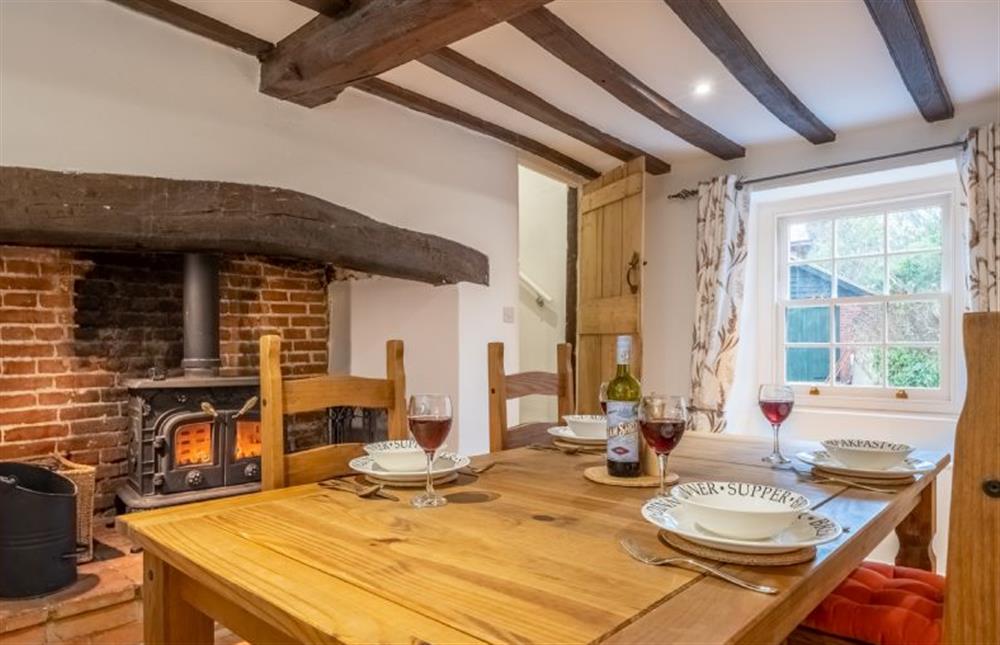 The dining rooms looks out to the village road at Owl Cottage, Great Snoring near Fakenham