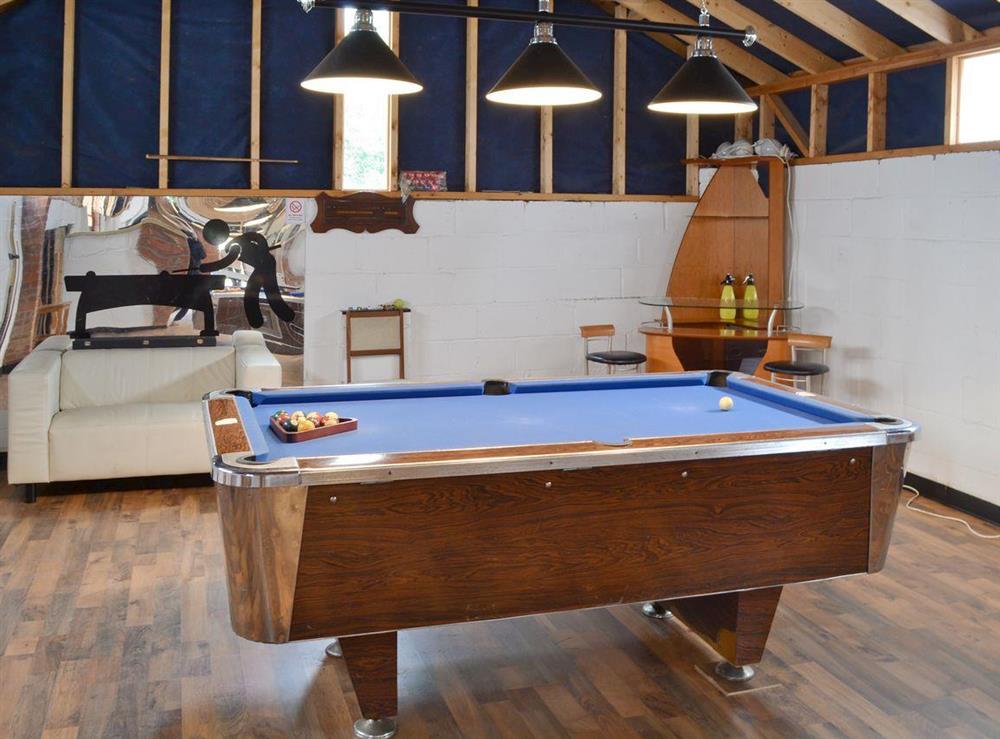 Pool table in the on-site games room at Owl Lodge in Forncett St Peter, near Long Stratton, Norfolk