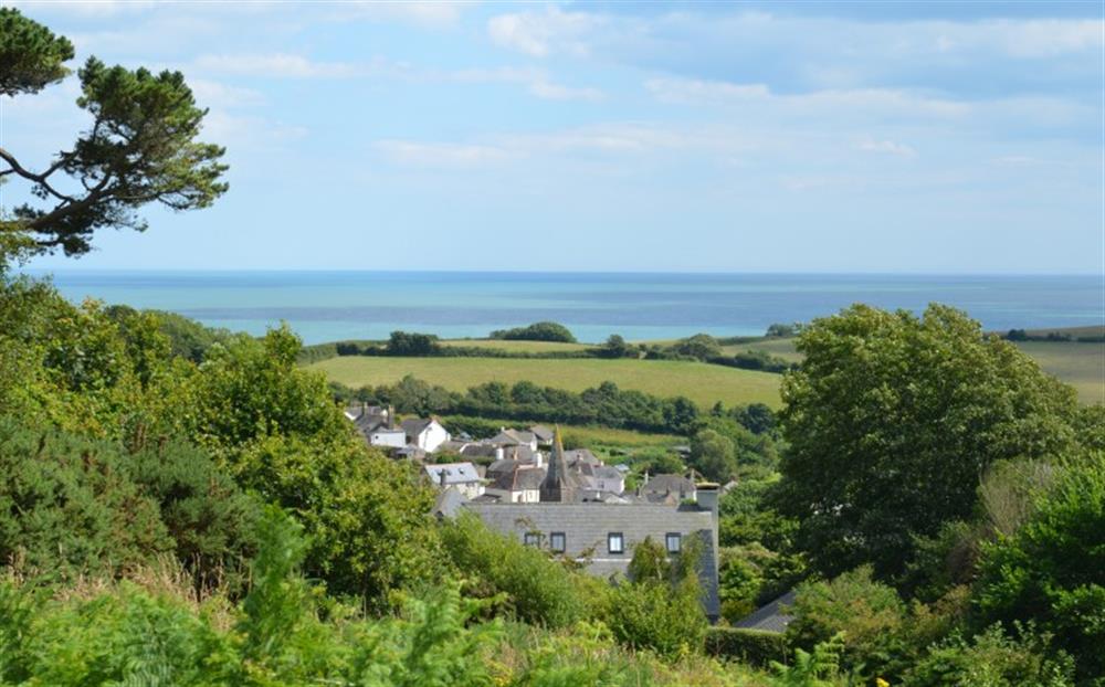 The view from the Slapton Millenium field over the pretty village and out to sea. at Owlacombe Cottage in Slapton