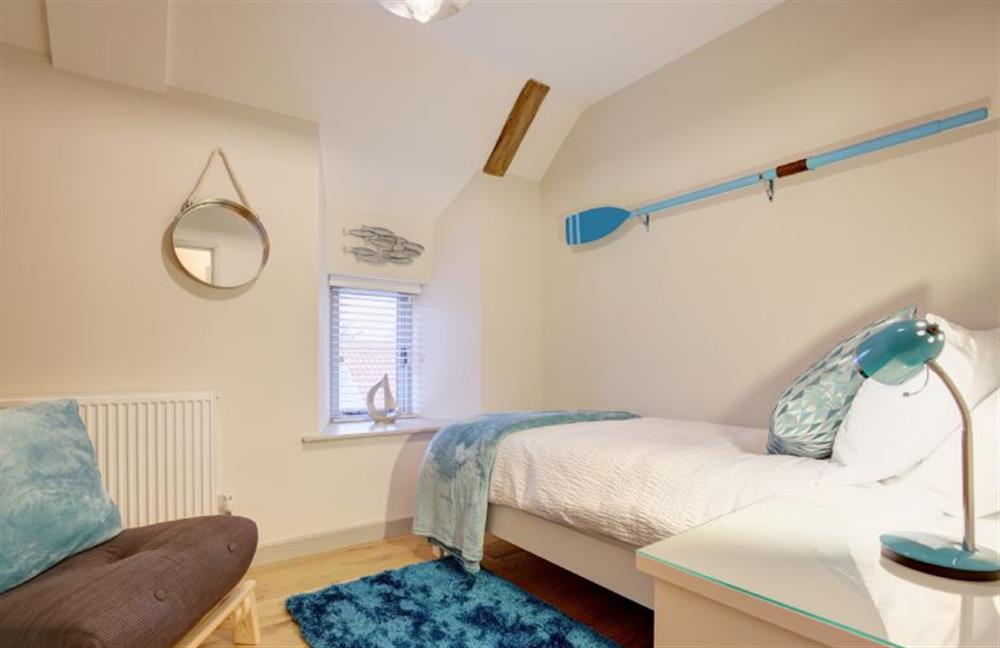 First floor: Bedroom three has full size single bed  and additional futon at Owlets at Mulberry Barn, Heacham near Kings Lynn