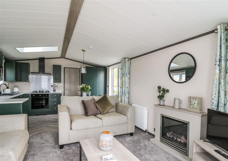Relax in the living area at Owls Meadow, Trefeglwys