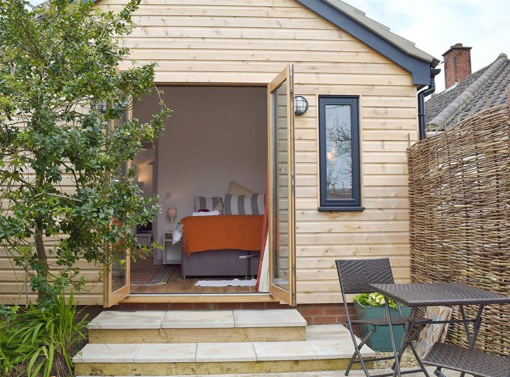 Charming property with direct access to/ from the bedroom and garden at Owls Roost in Aldeburgh, Suffolk