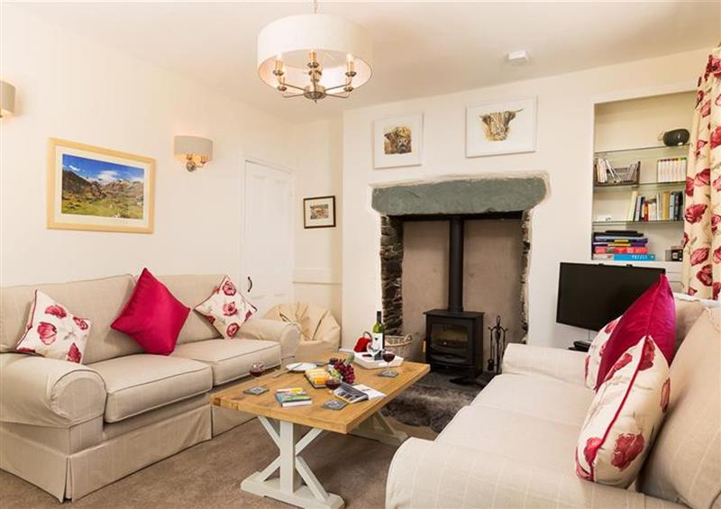 Relax in the living area at Oxen Fell Cottage, Langdale