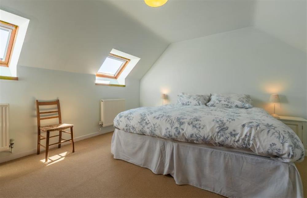 First floor: Bedroom two, super-king size bed at Oyster Barn, Titchwell near Kings Lynn