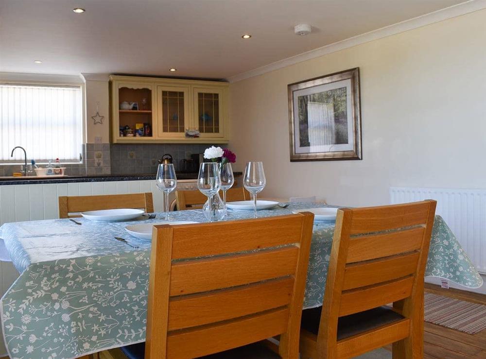 Dining and kitchen areas at Oyster Cottage in Whitstable, Kent