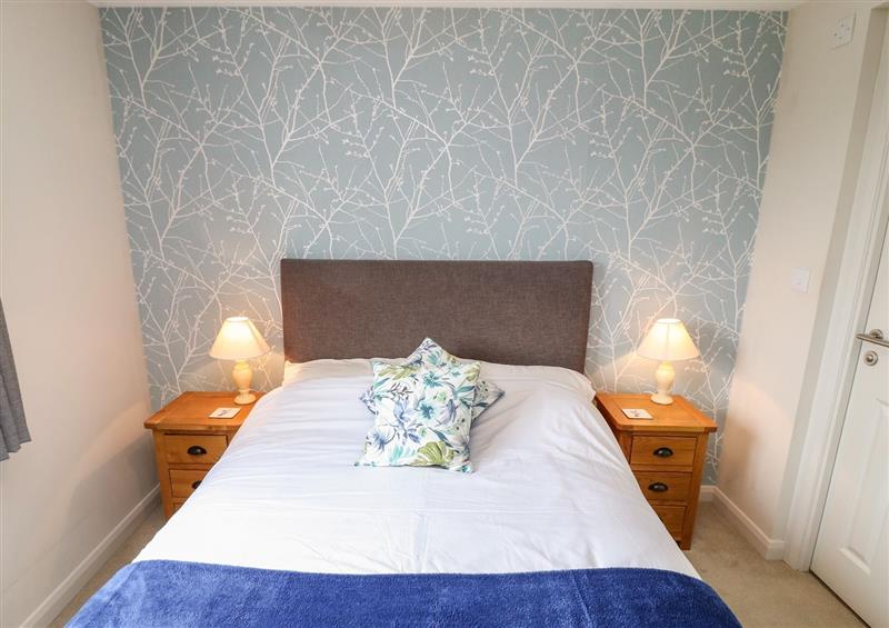 A bedroom in Oyster Lodge at Oyster Lodge, Newton Ferrers
