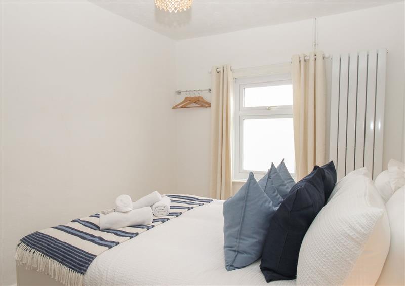 A bedroom in Oystercatcher Bay at Oystercatcher Bay, Weymouth