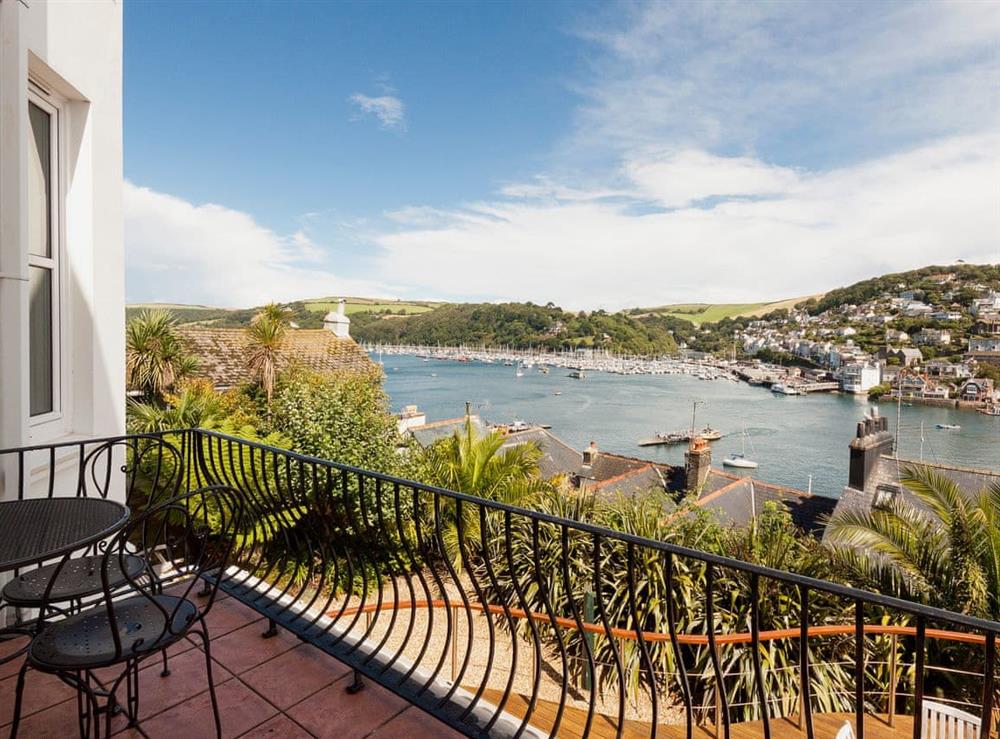 Large balcony off sitting room with bistro table and chairs at Oystercatcher  in Dartmouth, Devon