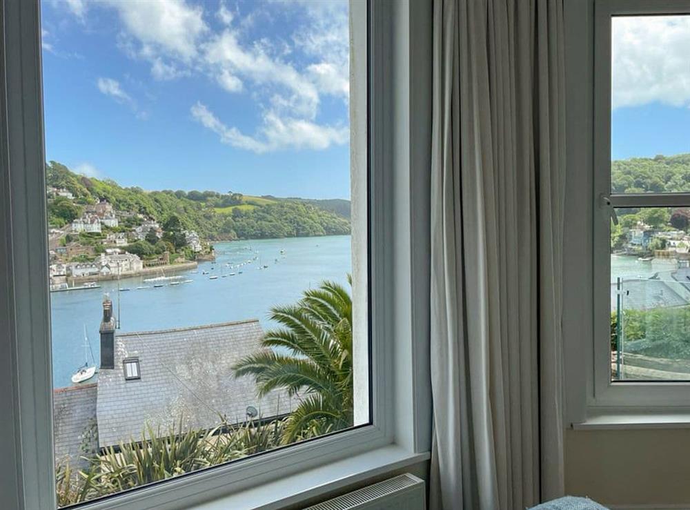 Water views from the bedroom at Oystercatcher  in Dartmouth, Devon