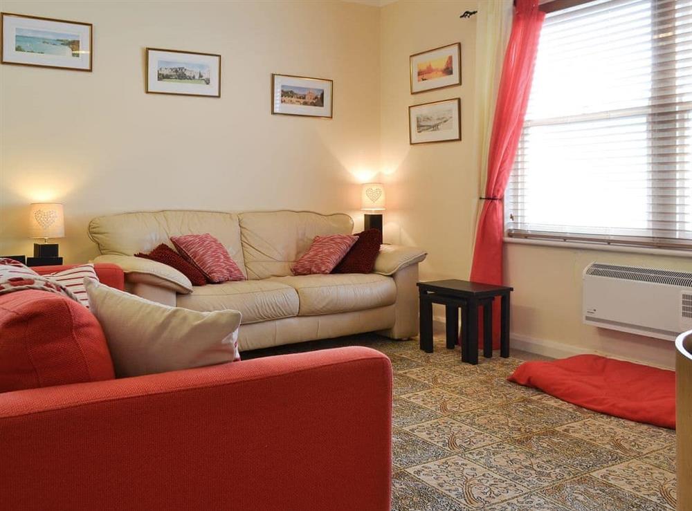 Comfortable sofas, one of which converts to a double sofa bed at Packhorse Court in Keswick, Cumbria, England