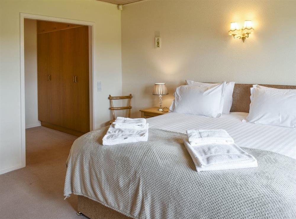 Relaxing master bedroom with adjoining dressing room at Paddock House in Middleham, near Leyburn, North Yorkshire