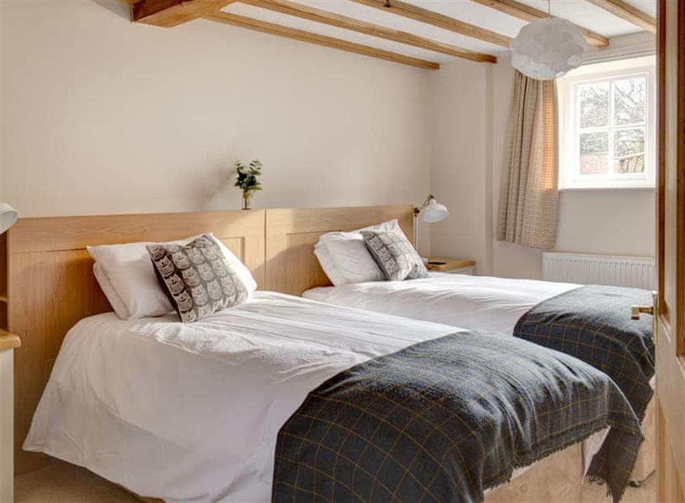 Twin bedroom at Paddocks Mill in Near Chipping Camden, England