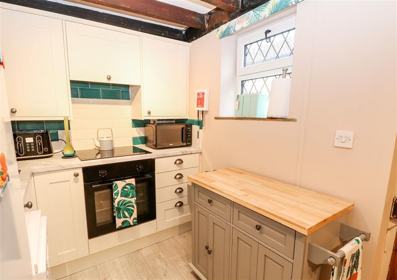 This is the kitchen at Palm Tree Cottage, Caister-On-Sea