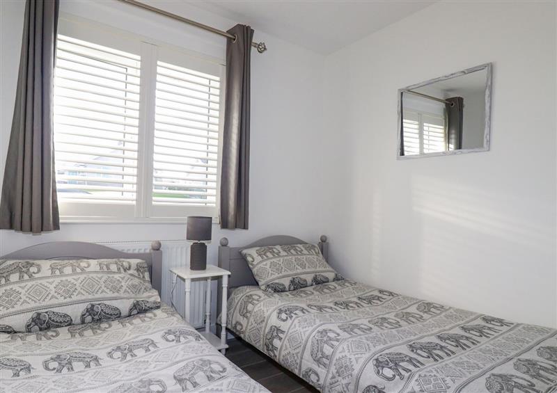 One of the bedrooms at Palm View, Holywell Bay