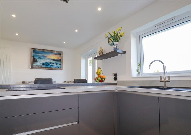 This is the kitchen (photo 2) at Palm View, Holywell Bay