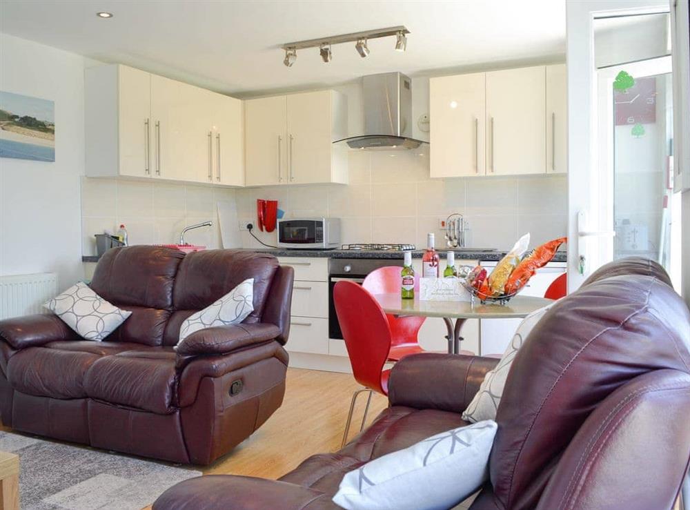 Light and airy open-plan living space at Palm Villa in Porth, near Newquay, Cornwall