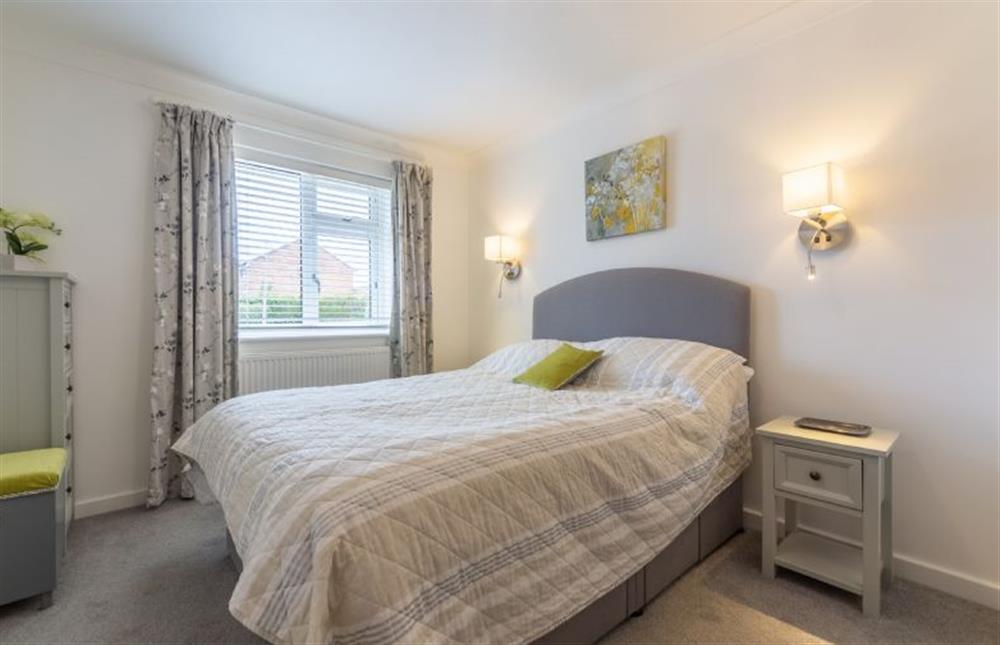 Palmstone: Master bedroom with a double bed and built-in wardrobe  at Palmstone, Heacham near Kings Lynn