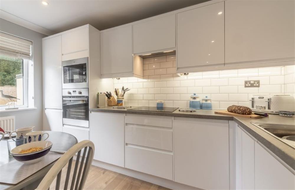Palmstone: The kitchen features eye height ovens and built in appliances at Palmstone, Heacham near Kings Lynn