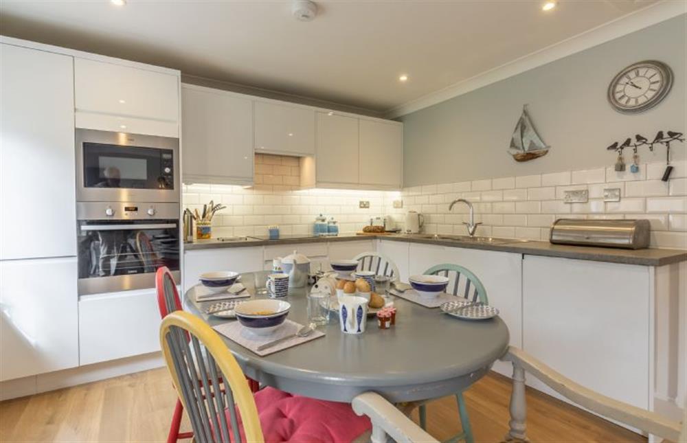 Palmstone: The well equipped kitchen with seating for four  at Palmstone, Heacham near Kings Lynn