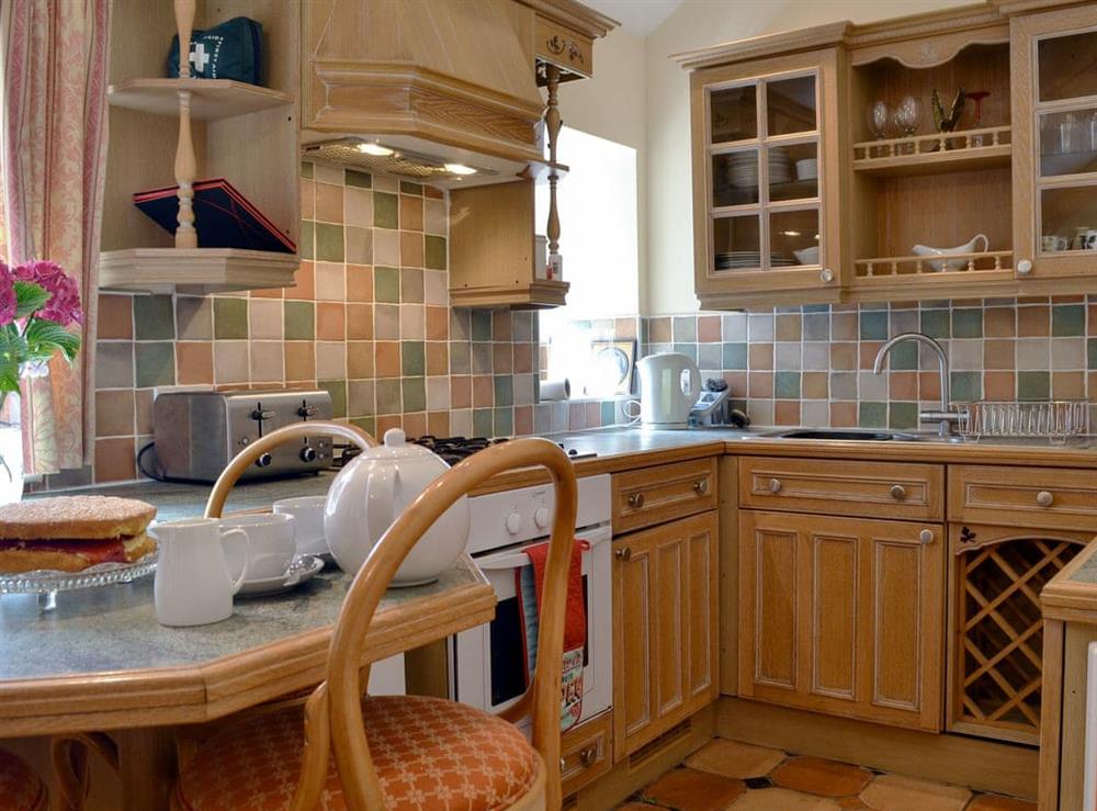 Farmhouse style kitchen area at Pant Y Mel in Llanbedrgoch, near Benllech, Anglesey, Gwynedd