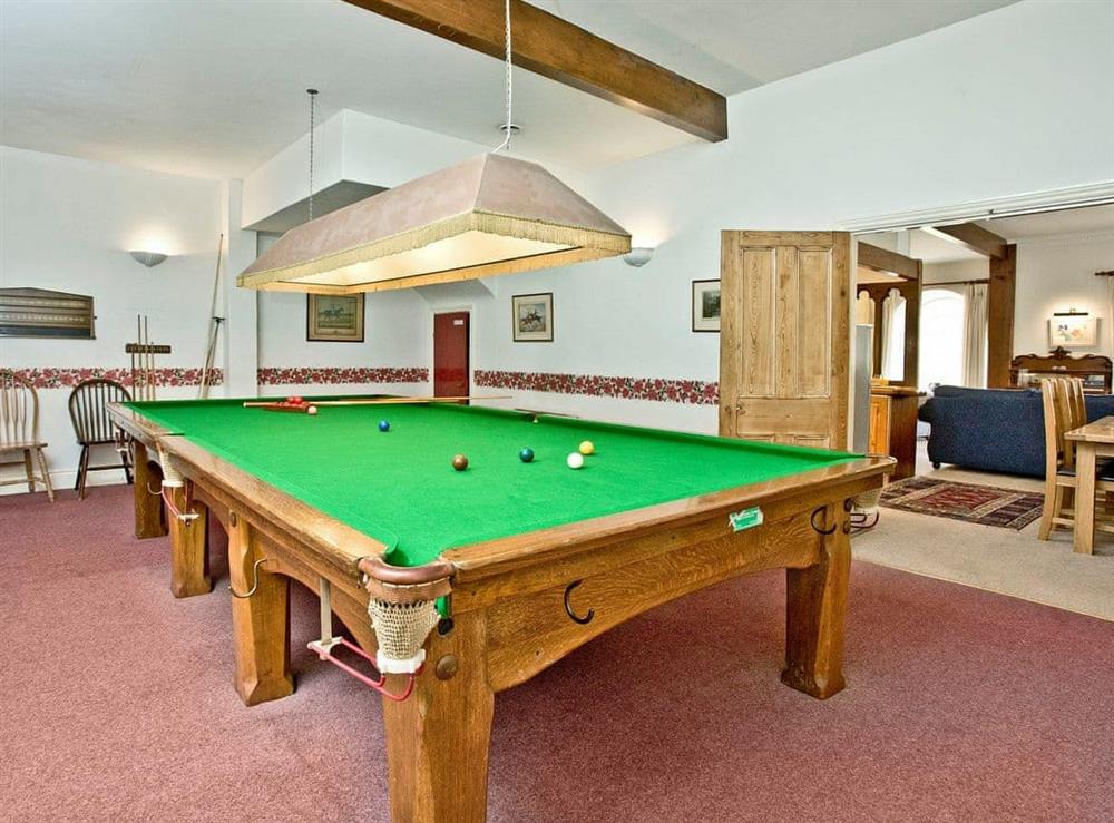 Impressive games room with a full size snooker table at Papermaker’s Cottage in Bow Creek, Nr Totnes, South Devon., Great Britain