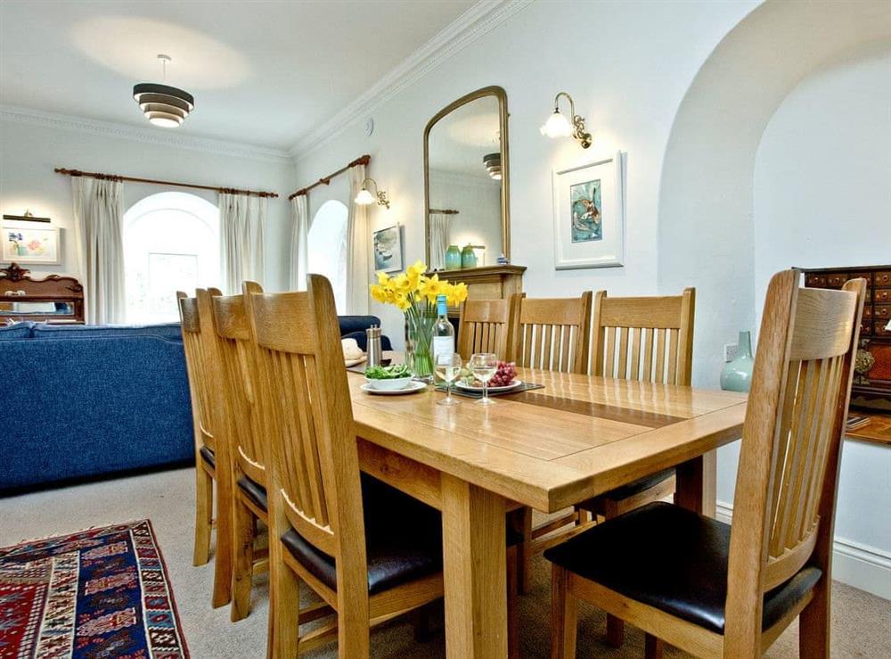 Sociable dining area at Papermaker’s Cottage in Bow Creek, Nr Totnes, South Devon., Great Britain