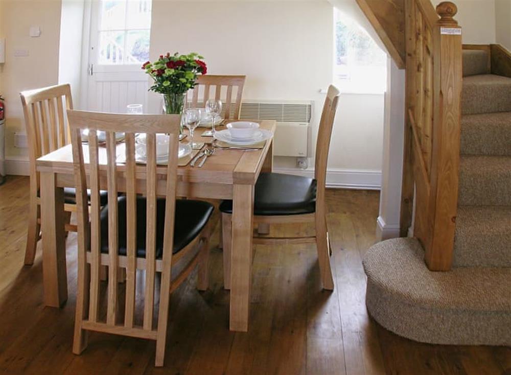 Dining area at Parc Y Bryn Lodge in Broadlay, near Ferryside, Dyfed